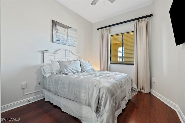 bedroom featuring dark hardwood / wood-style floors and ceiling fan