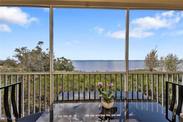 101 N Marion Ct Unit 122, Punta Gorda, FL 33950 - unfurnished sunroom with a water view