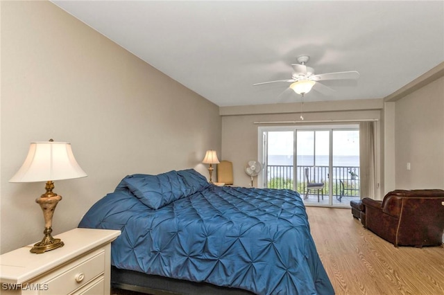 bedroom with light wood-style floors, access to outside, and a ceiling fan