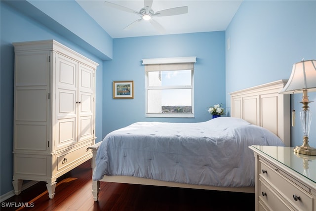 bedroom featuring hardwood / wood-style floors and ceiling fan