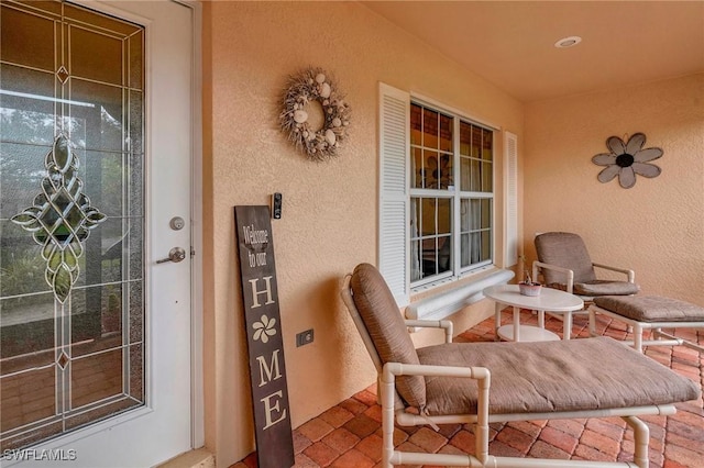 exterior space with ceiling fan and covered porch