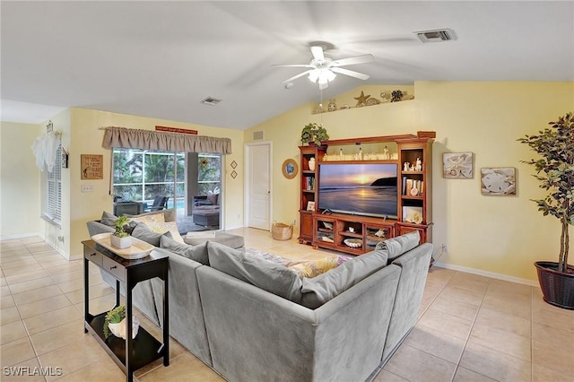 living room featuring ceiling fan, light tile patterned flooring, and vaulted ceiling