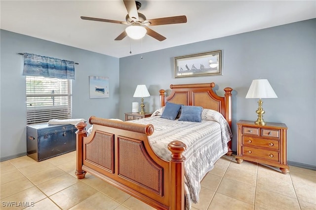 bedroom featuring ceiling fan and light tile patterned floors