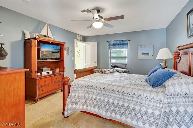 bedroom featuring ceiling fan and light tile patterned flooring