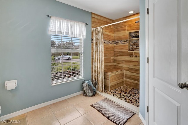 bathroom featuring tile patterned flooring and a shower with shower curtain