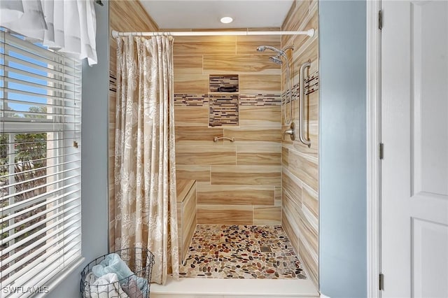 bathroom with curtained shower