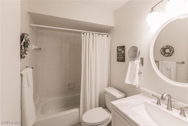 full bathroom featuring toilet, vanity, and shower / bath combo