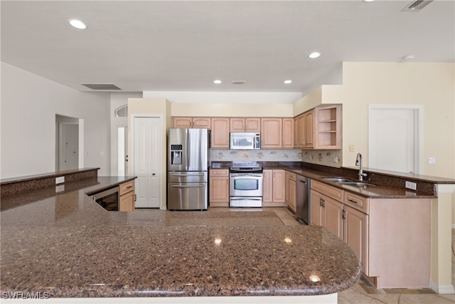 kitchen featuring sink, light brown cabinets, stainless steel appliances, wine cooler, and kitchen peninsula