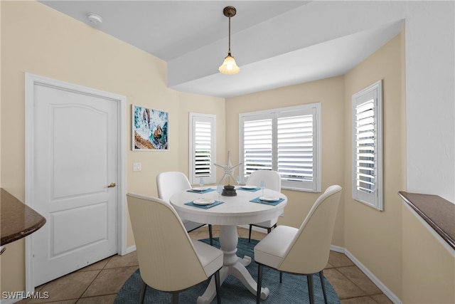 dining area featuring light tile patterned floors