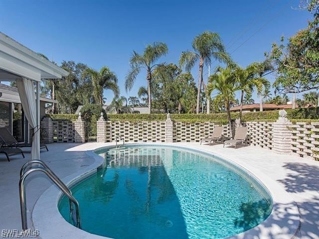 view of pool with a patio area