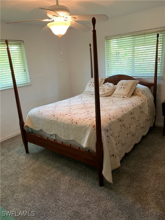 bedroom with ceiling fan and carpet