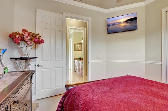 bedroom featuring light tile patterned floors and crown molding