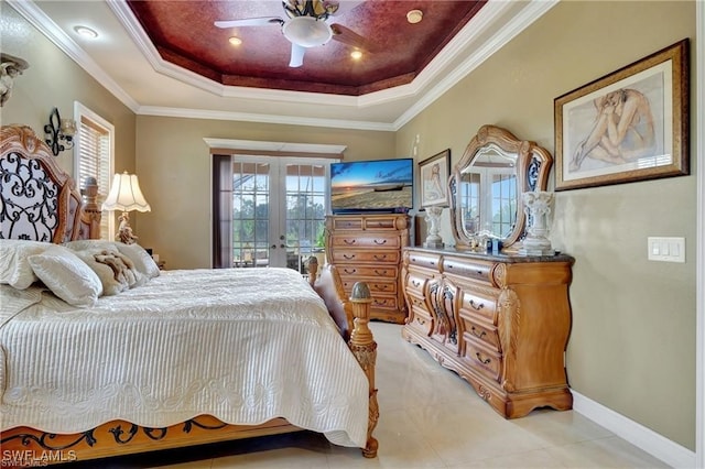 bedroom featuring french doors, ornamental molding, a raised ceiling, and multiple windows