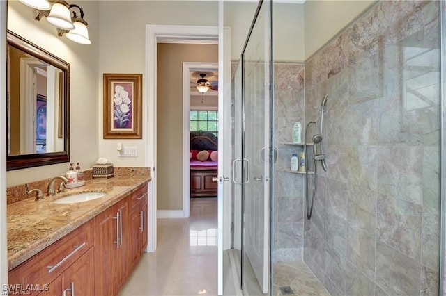 bathroom featuring vanity, tile patterned floors, ceiling fan, and walk in shower