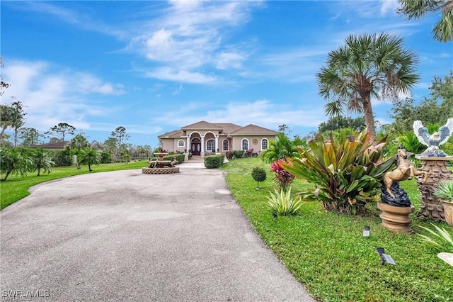 view of front of property with a front lawn