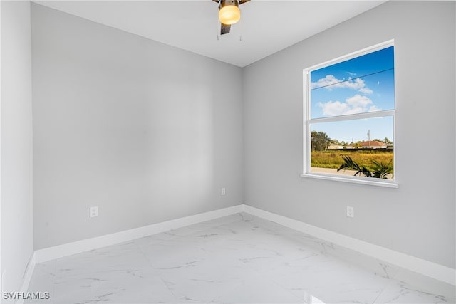 unfurnished room with ceiling fan