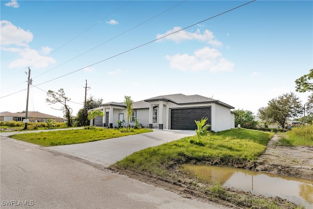 ranch-style house with a front yard and a garage