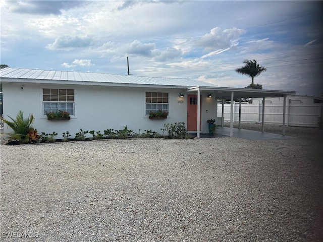 view of front of house featuring a carport