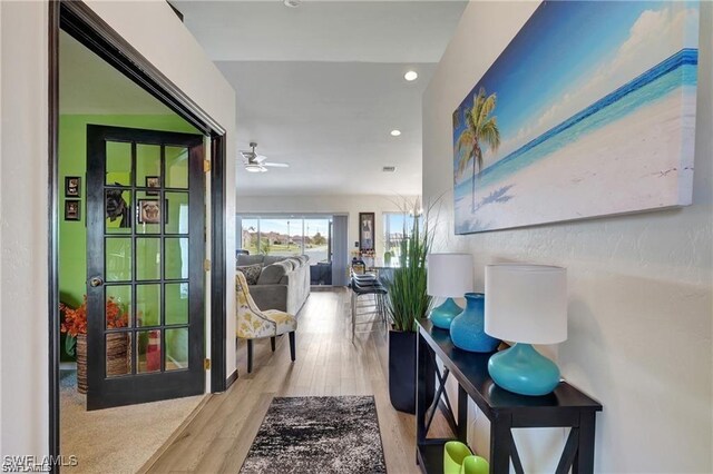 hall featuring light hardwood / wood-style flooring