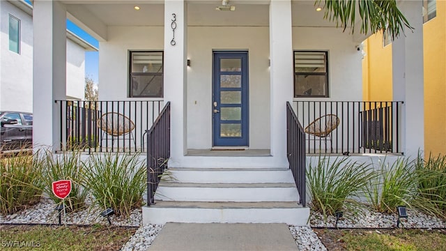 entrance to property with covered porch