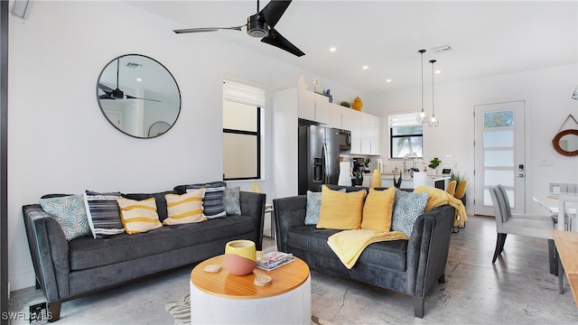 living room featuring ceiling fan