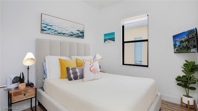 3016 Van Buren Ave, Naples, FL 34112 - bedroom featuring wood finished floors and baseboards