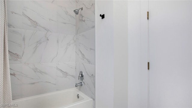 bathroom featuring shower / bath combo with shower curtain