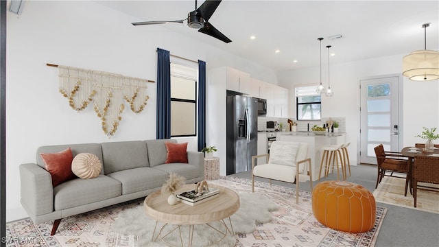 living room featuring ceiling fan