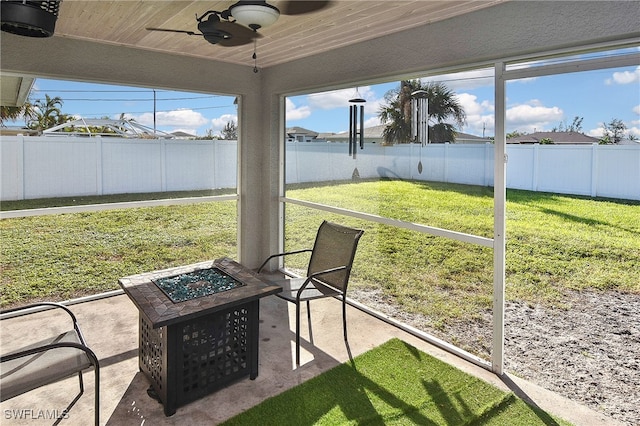 unfurnished sunroom with plenty of natural light and wood ceiling