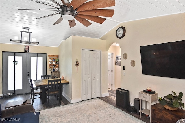 living room featuring lofted ceiling, french doors, ceiling fan, light wood-type flooring, and wood ceiling