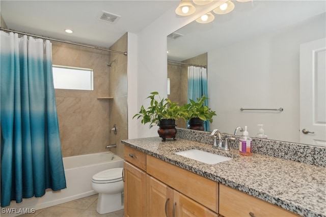 176 Venus Cay Cay, Naples, FL 34114 - full bathroom featuring shower / tub combo with curtain, vanity, toilet, and tile patterned flooring