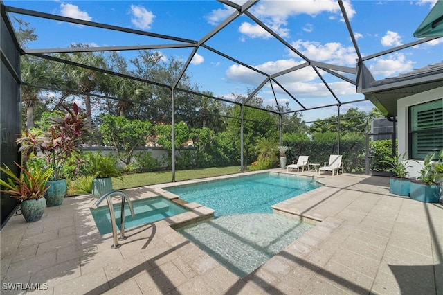 view of swimming pool with a lanai and a patio