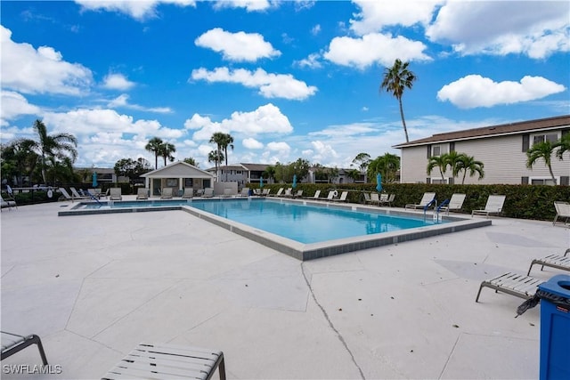 view of pool featuring a patio area