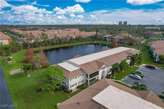 drone / aerial view with a water view