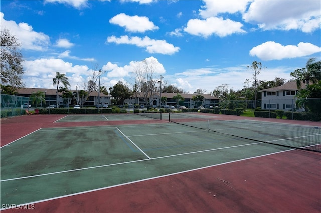 view of sport court with basketball hoop