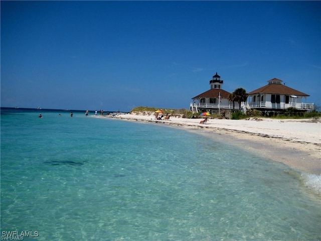 water view featuring a view of the beach and a gazebo