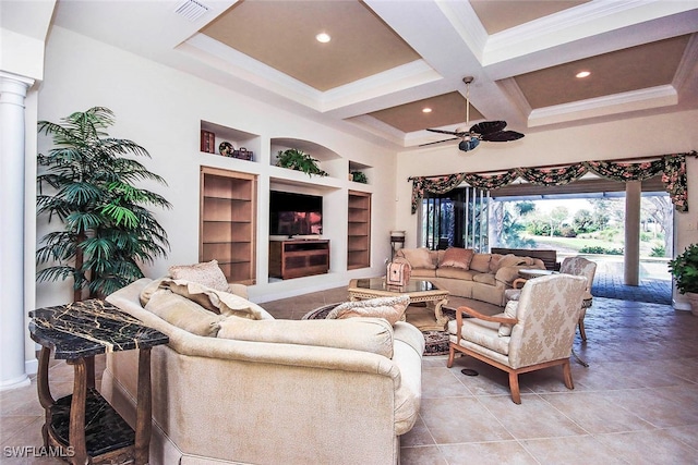 tiled living room featuring beam ceiling, ceiling fan, coffered ceiling, built in features, and ornamental molding