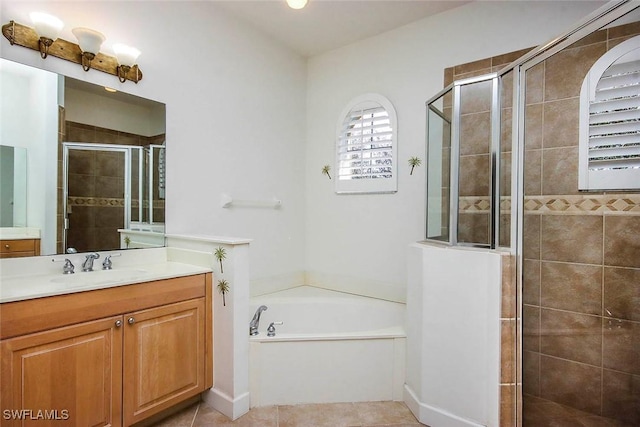 8921 Crown Colony Blvd, Fort Myers, FL 33908 - full bath featuring vanity, a stall shower, a bath, and tile patterned flooring