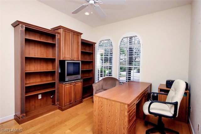 home office featuring ceiling fan and light wood-type flooring