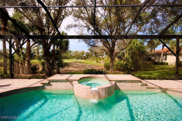 8921 Crown Colony Blvd, Fort Myers, FL 33908 - view of swimming pool featuring glass enclosure and a pool with connected hot tub