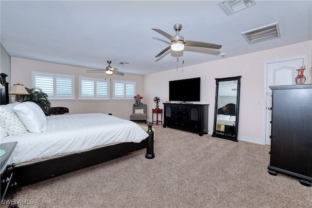 bedroom with light colored carpet and ceiling fan