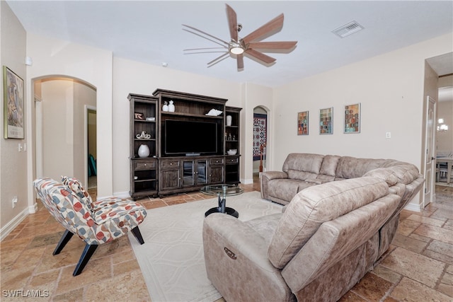 living room featuring ceiling fan