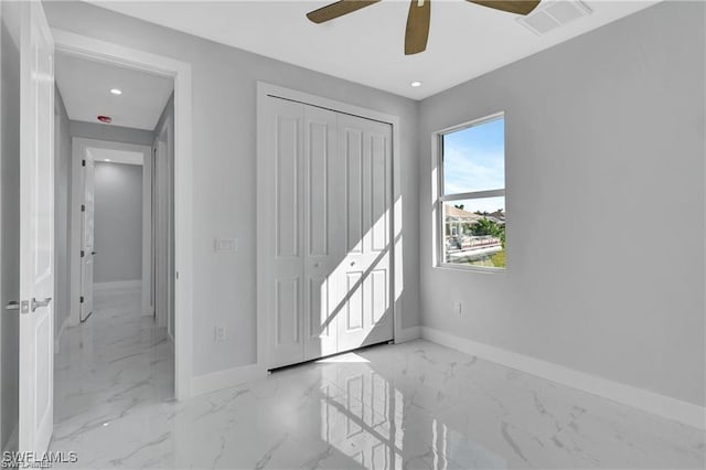 entryway with ceiling fan