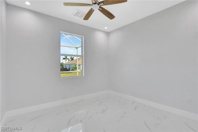 unfurnished room with ceiling fan