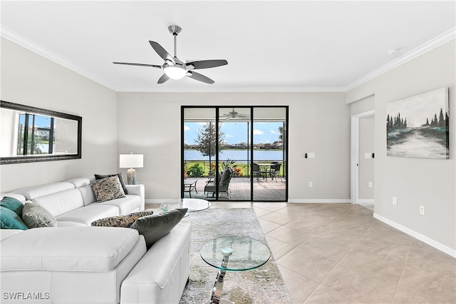 living room with crown molding, ceiling fan, light tile patterned floors, and a water view