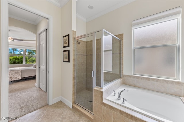 bathroom with tile patterned floors, independent shower and bath, ceiling fan, and crown molding