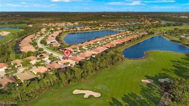 bird's eye view with a water view and a residential view