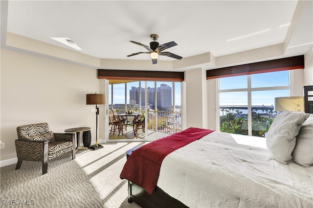 bedroom featuring access to exterior, carpet floors, and ceiling fan