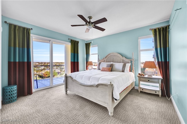 bedroom with access to outside, light carpet, and ceiling fan