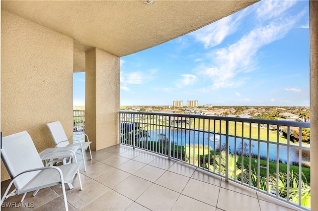 balcony featuring a water view